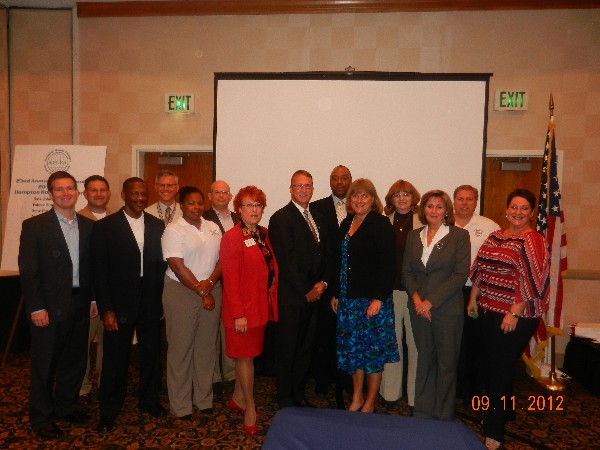 In September, incoming chapter board of directors members are (l-r) Ryan Fedell, Cmdr. Pereira, James Lee, James Pasch, Natasha Parker, Doug Vanderlip, Jackie Gilmartin, Mark Bowers, Tim Goodrich, Teresa Duvall, Mary Yager, Patti Hamilton, Steve Frasier and Melissa Helm.